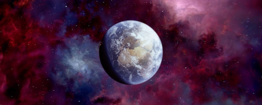 The earth in the middle of a swirling galaxy of stars