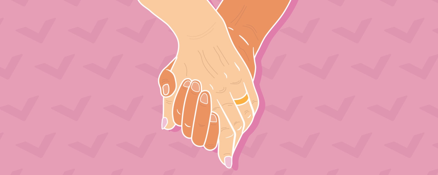 A middle-aged couple holding hands.
