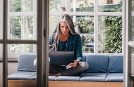 Article Gallery Mature Woman On Laptop Mobile