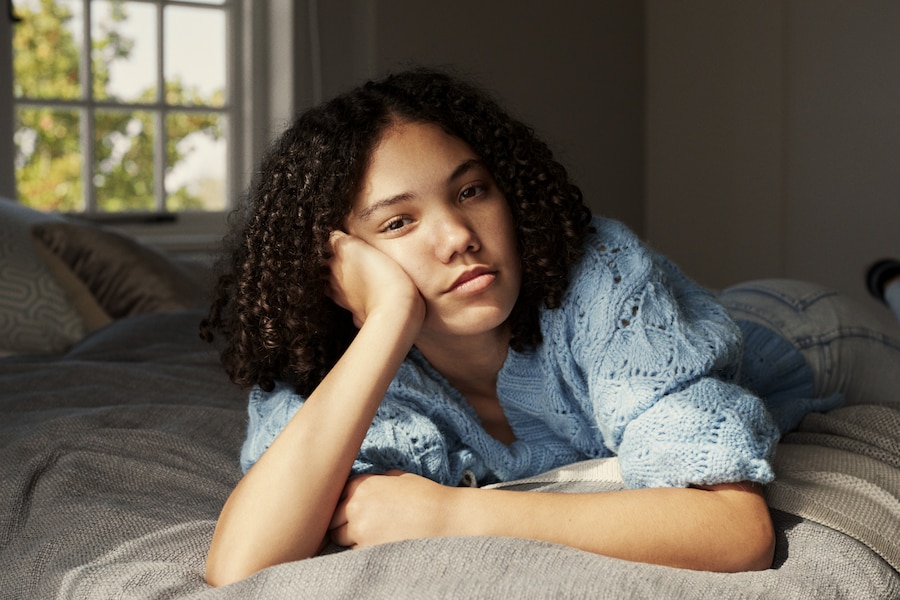 Woman looking exasperated due to period coming