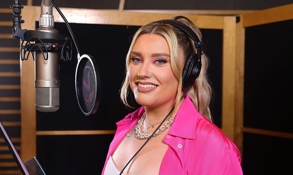 Ella Henderson Singing Into Mic Whooah Bodyform Campaign Webpage Signpost Image