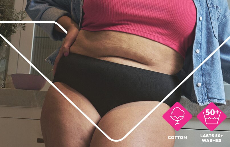 Woman wearing bodyform period pants with pink icon symbolizing they are made from cotton